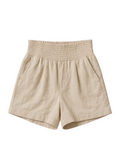 Beige smocked cotton/linen blend shorts with deep front pockets and an elastic waistband.