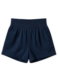 Navy blue cotton/linen smocked shorts with deep front pockets and an elastic waistband.