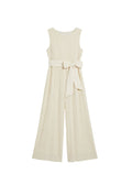 White Flow Jumpsuit: Sleeveless, wide-leg Tencel jumpsuit with a pleated texture and a tied waist belt.