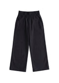 Black wide-leg flow pant in cotton/linen blend, featuring an elastic waist and side pockets.