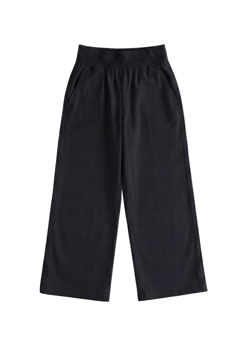 Black wide-leg flow pant in cotton/linen blend, featuring an elastic waist and side pockets.