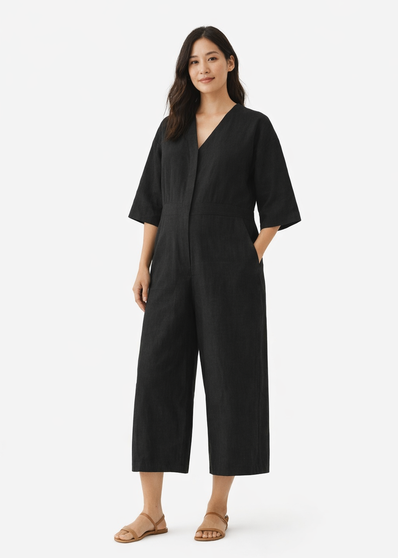 Button-Front Wide-Leg Linen Jumpsuit in Linen in Black — on model