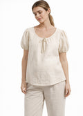 Tie-Neck Puff-Sleeve Cropped Linen Blouse in Linen in Natural — on model