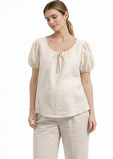 Tie-Neck Puff-Sleeve Cropped Linen Blouse in Linen in Natural — on model