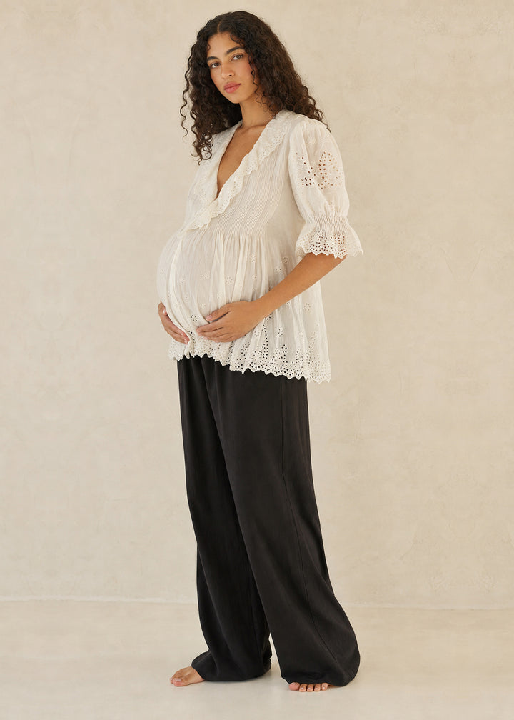 Eyelet Ruffle Puff Sleeve Blouse in Cotton in Natural — on model