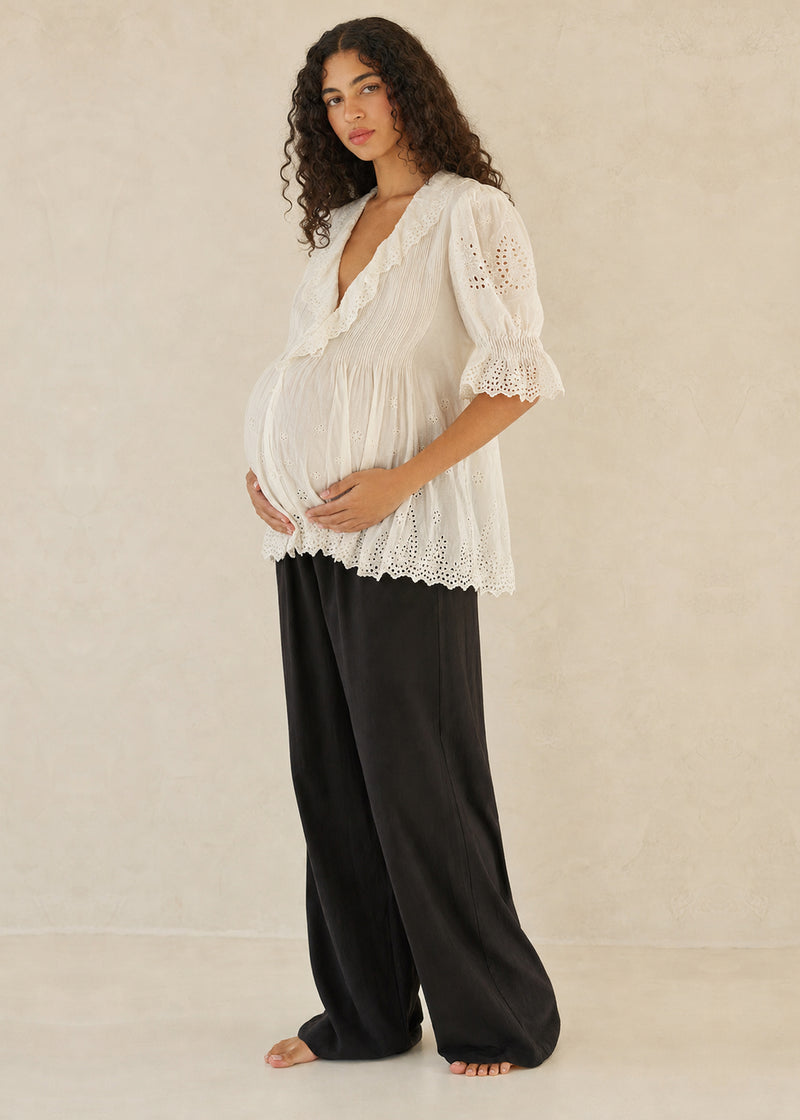 Eyelet Ruffle Puff Sleeve Blouse in Cotton in Natural — on model