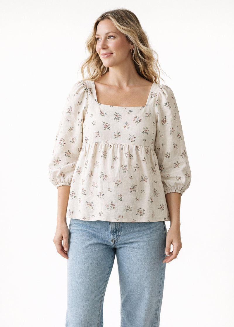 Puff-Sleeve Square-Neck Shirred-Back Floral Linen Blouse in Linen in Cream Floral — on model