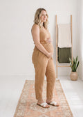 Muslin Jumpsuit in Camel — on model