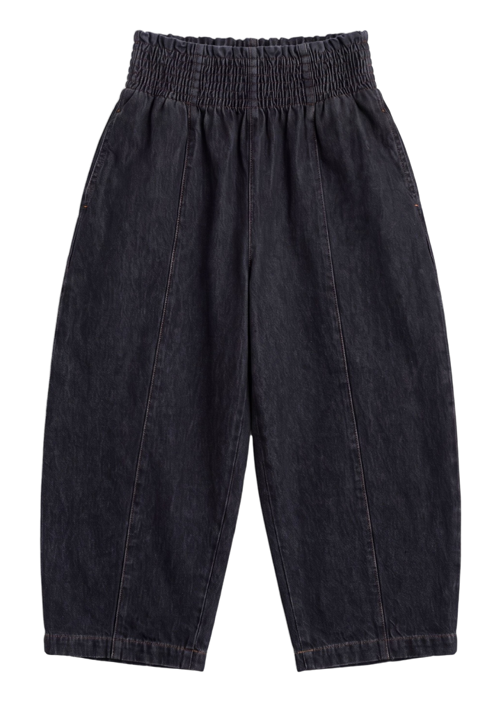 The Balloon Jean Pant in black, laid flat