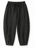 Barrel-Leg Under-Bump Drawstring Linen Pants in Linen in Black — flat lay