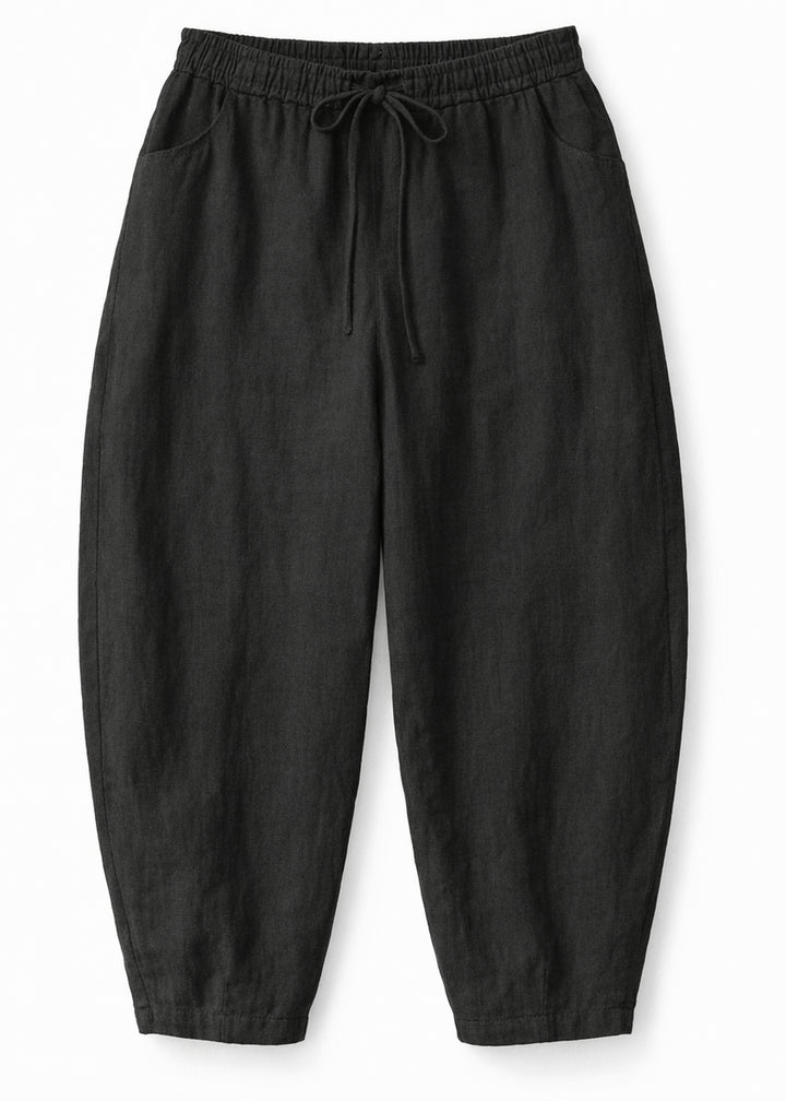 Barrel-Leg Under-Bump Drawstring Linen Pants in Linen in Black — flat lay