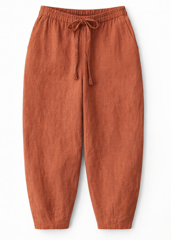 Barrel-Leg Under-Bump Drawstring Linen Pants in Linen in Clay — flat lay