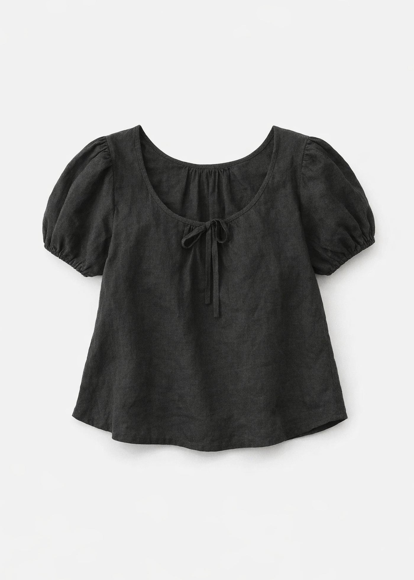 Tie-Neck Puff-Sleeve Cropped Linen Blouse in Linen in Black — flat lay