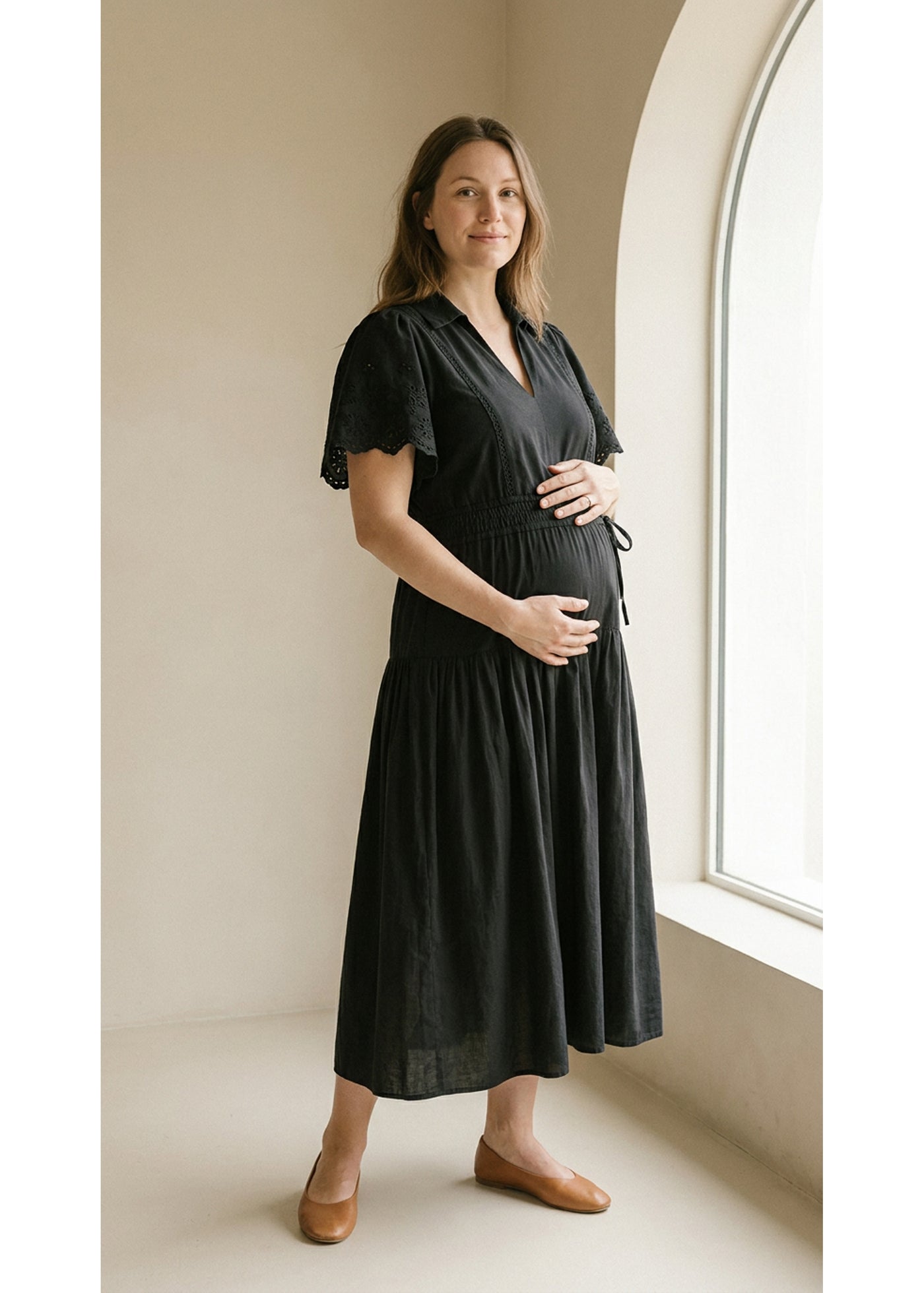 Eyelet Sleeve Maternity Midi Dress in Black — on model