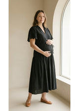 Eyelet Sleeve Maternity Midi Dress in Black — on model